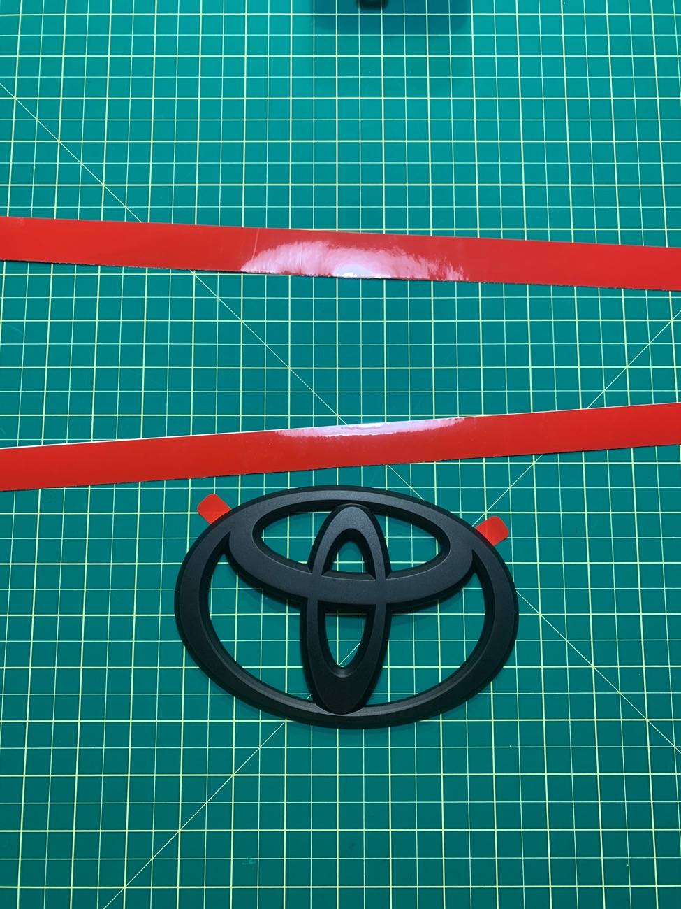 2024 Tacoma Blackout badge customized with red accent 0F552CAA-99B0-45CA-9A90-6CC3D62DE819