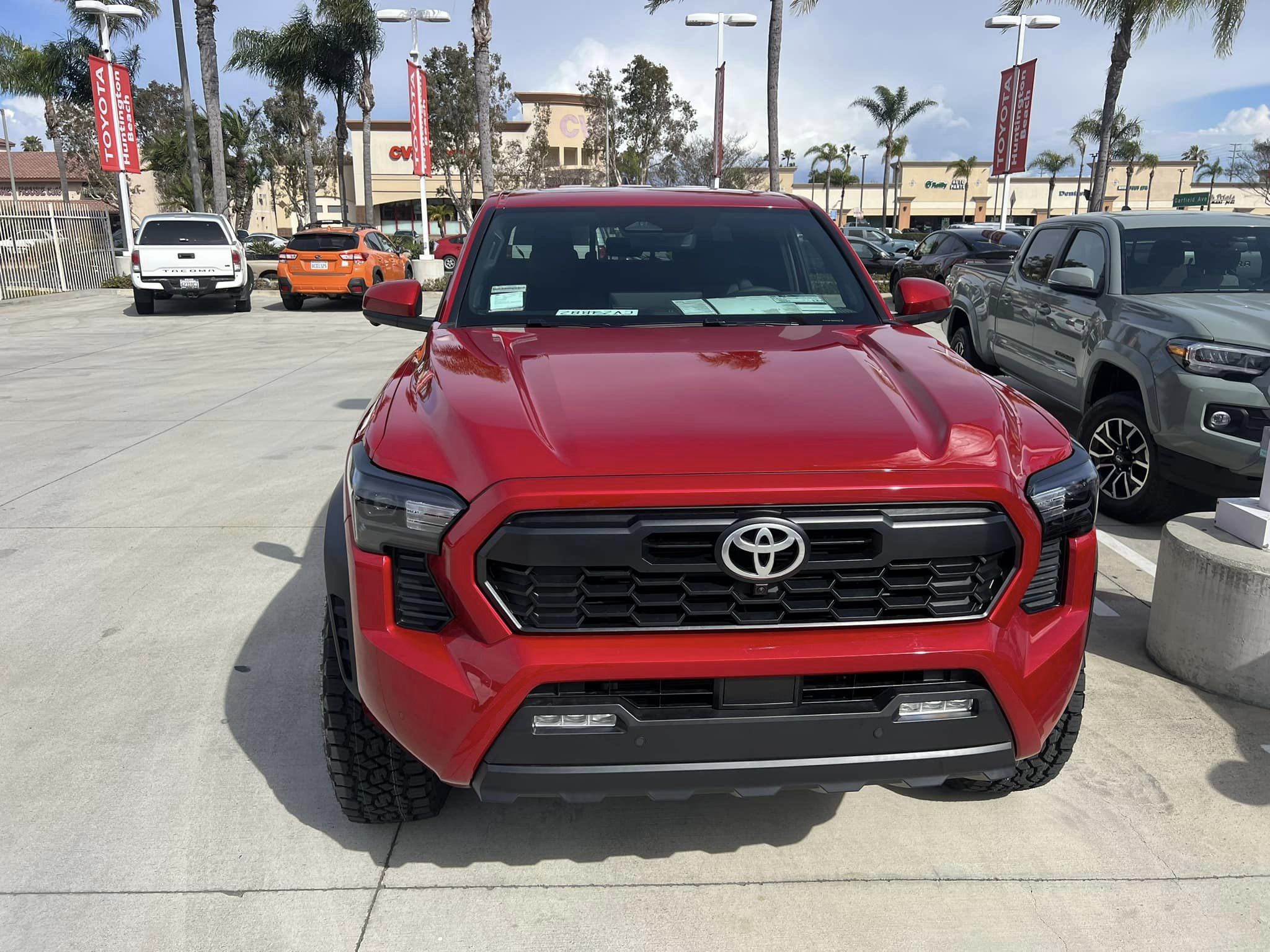 2024 Tacoma TRD SPORT SuperSonic Red + Method 18%22 wheels with 285:70:18 Toyo Open Country A:...jpg