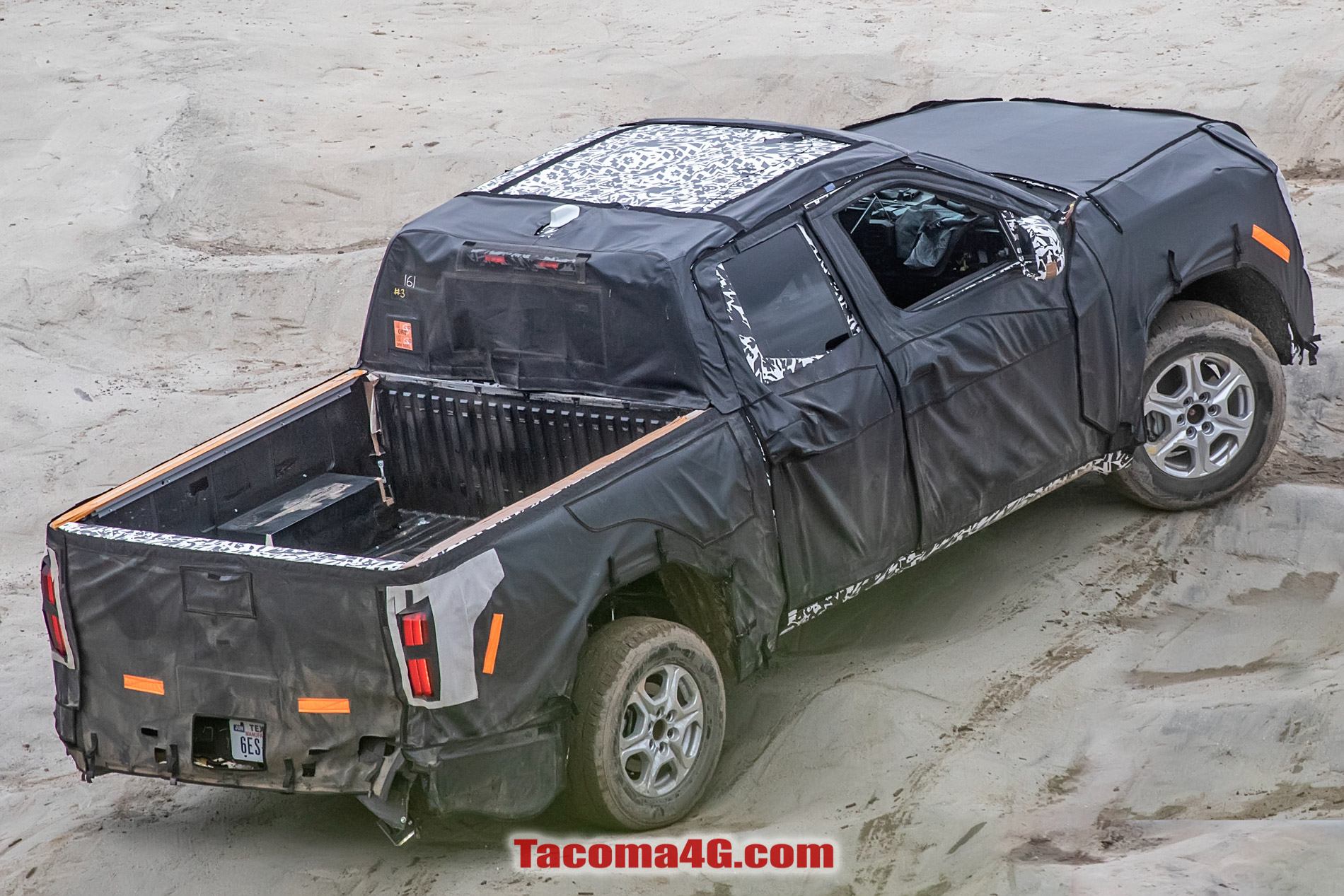 2024 Tacoma New 2024 Tacoma (4th Next Gen) Mule Off-Road Testing Reveals More Suspension Details -- 5/27/22 2024 Toyota Tacoma 4th gen spy photos suspension interior 16