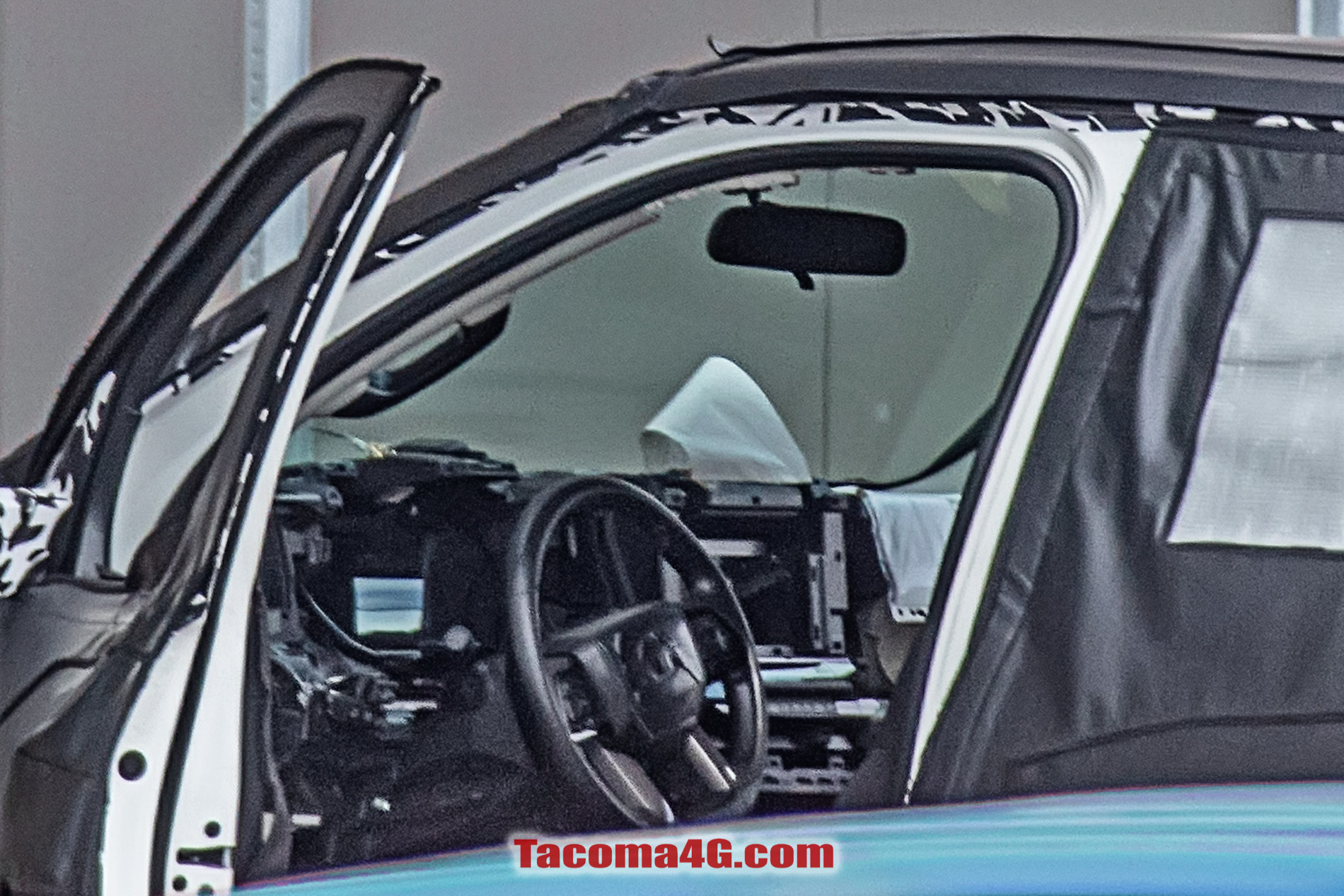 2024 Tacoma New 2024 Tacoma (4th Next Gen) Mule Off-Road Testing Reveals More Suspension Details -- 5/27/22 2024 Toyota Tacoma 4th gen spy photos suspension interior 24