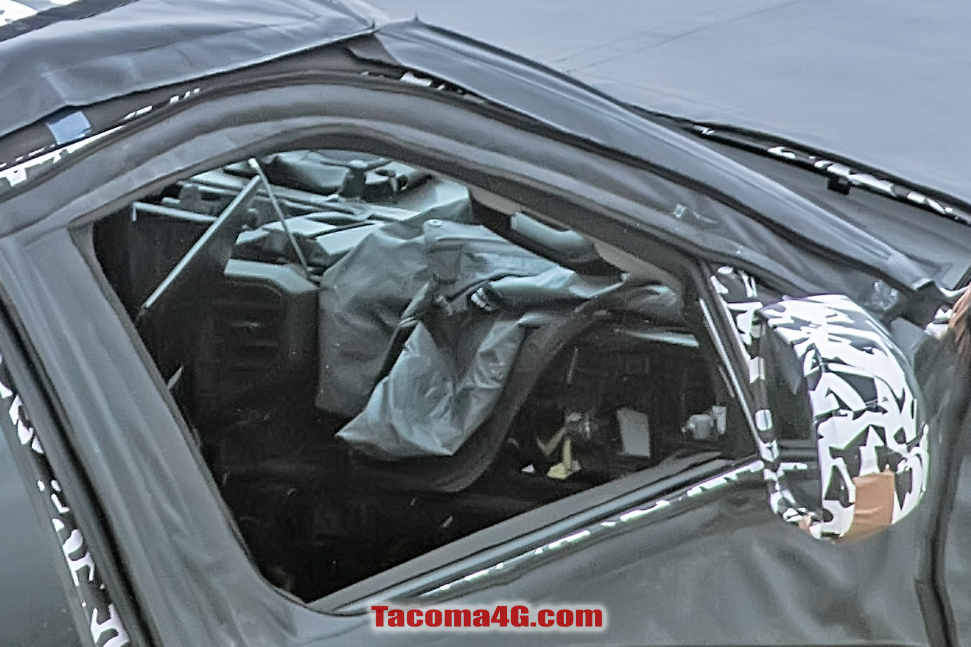 2024 Tacoma New 2024 Tacoma (4th Next Gen) Mule Off-Road Testing Reveals More Suspension Details -- 5/27/22 2024 Toyota Tacoma 4th gen spy photos suspension interior 8