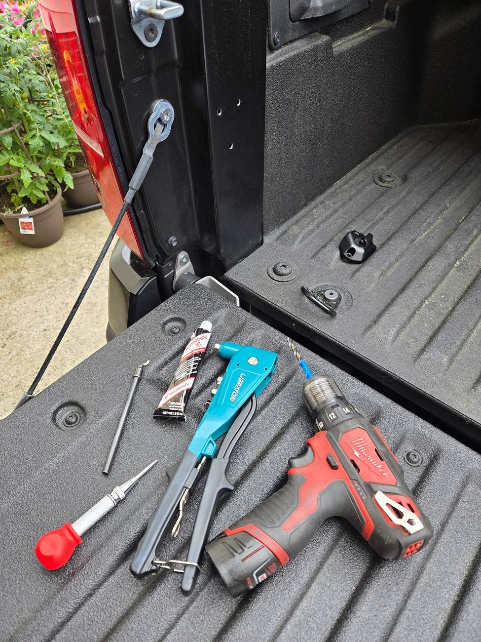 2024 Tacoma Installing OEM Bed Extender - DIY Instructions & Photos 20250412_134415
