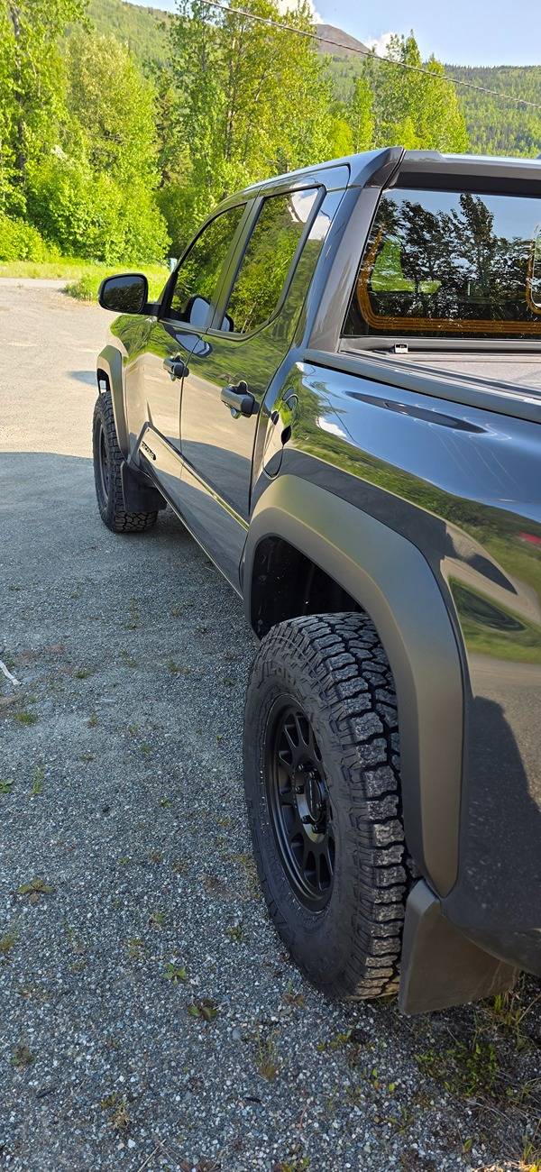 2024 Tacoma OEM mudflaps. Canada vs US. 20250612_185253