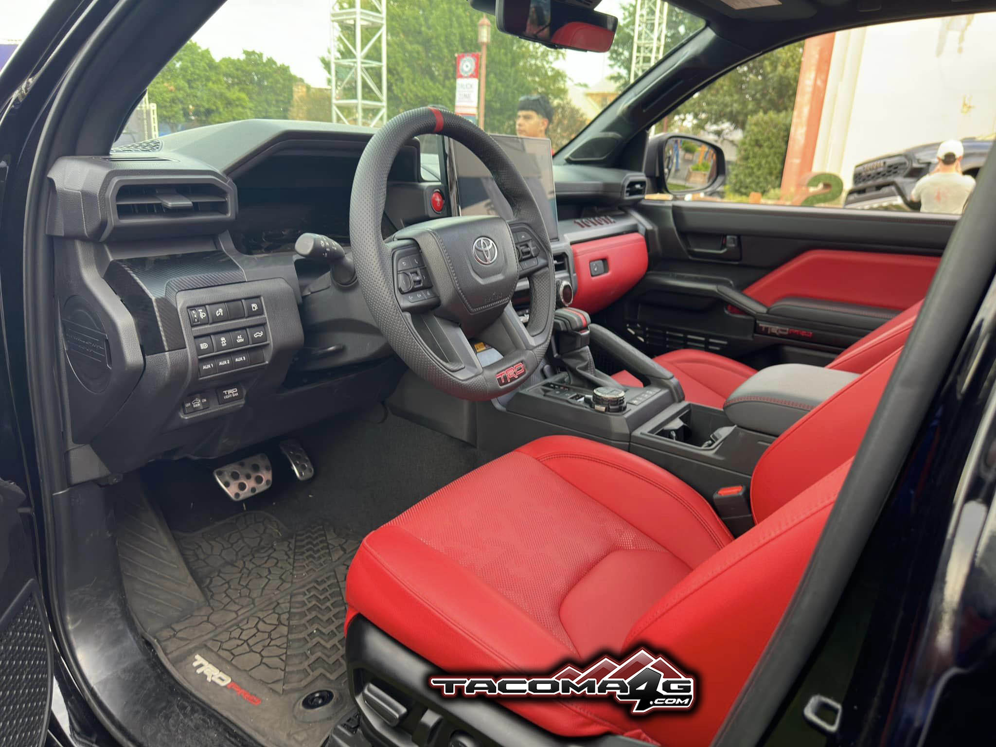 2024 Tacoma More Black 2024 Tacoma TRD PRO and Black TRAILHUNTER pics 4th gen Black Tacoma TRD Pro Red Interior 2024 model 3