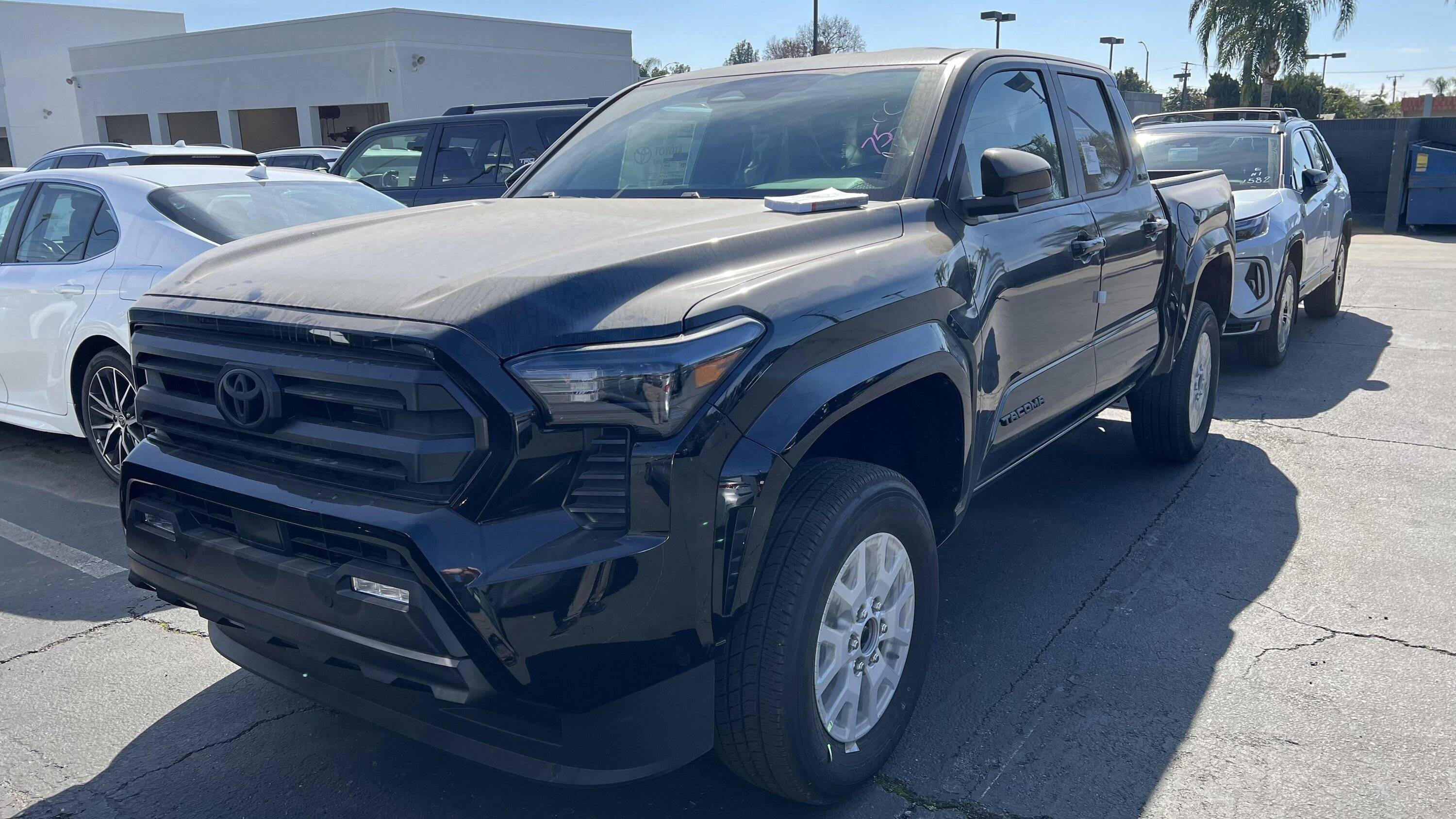 2024 Tacoma Black 2024 Tacoma SR5 at Toyota Whittier, CA (exterior & interior w/ small screen) Black 2024 Tacoma SR5 3