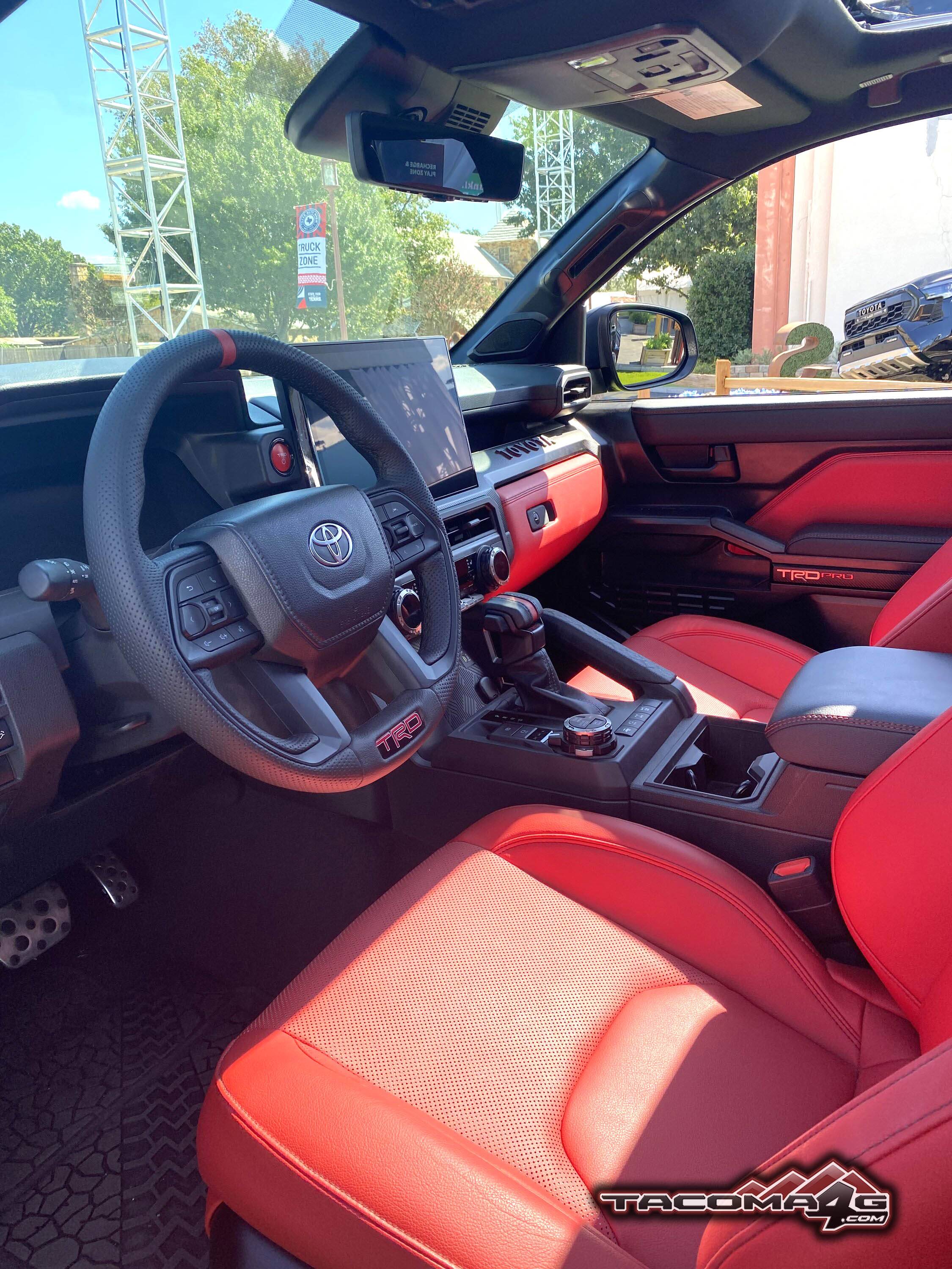 2024 Tacoma Official BLACK 2024 Tacoma Thread (4th Gen) BLACK 2024 Tacoma TRD PRO - Red Interior Isodynamic Seats Texas TX State Fair 3