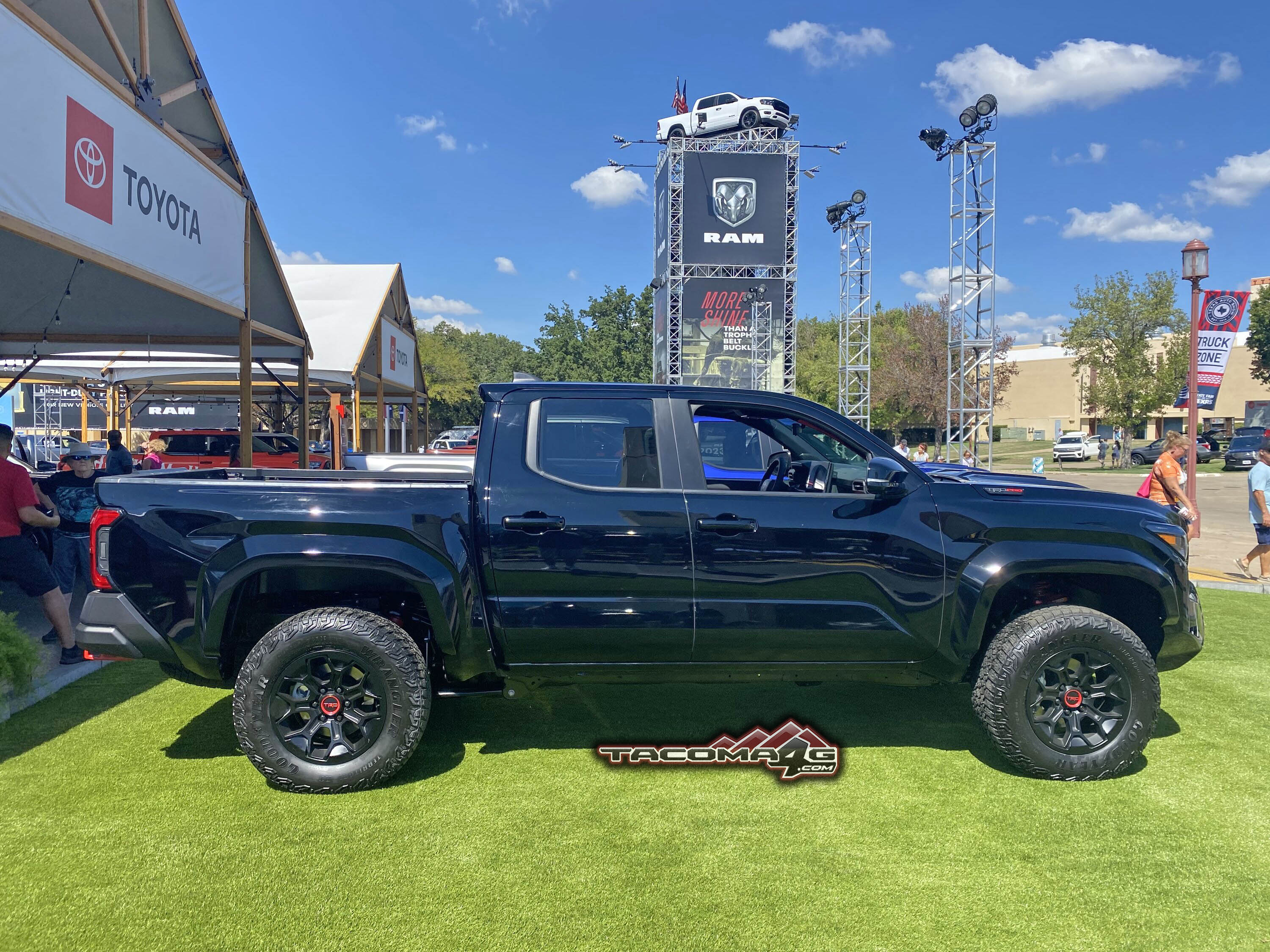 2024 Tacoma Official BLACK 2024 Tacoma Thread (4th Gen) BLACK 2024 Tacoma TRD PRO - Red Interior Isodynamic Seats Texas TX State Fair 5