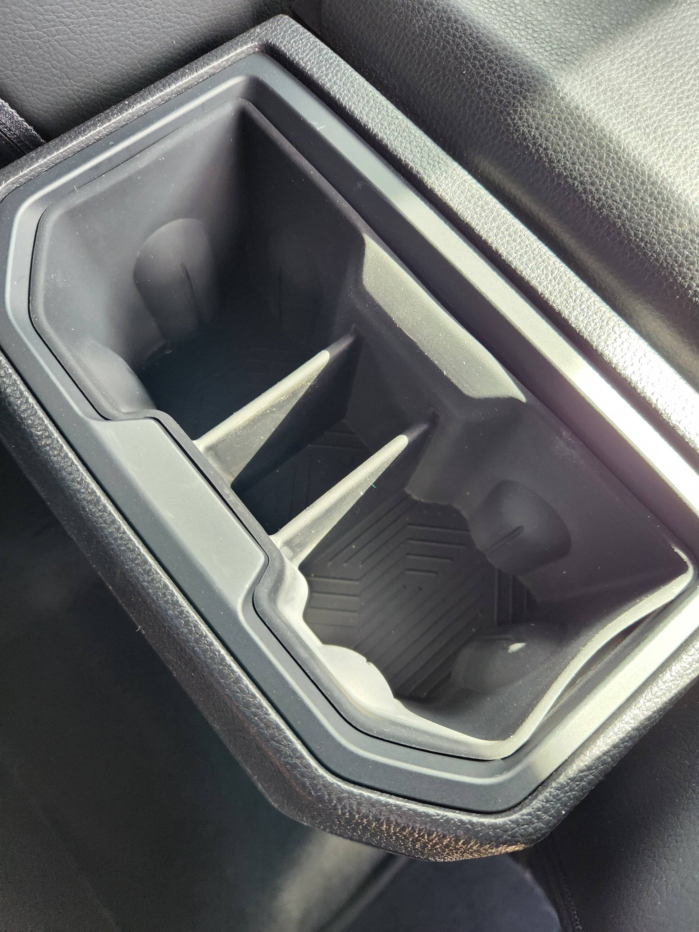2024 Tacoma Muslogy front and rear cupholder inserts installed Cupholder (1)