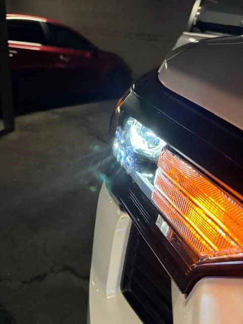 2024 Tacoma Interesting Easter Egg - Japanese words projected onto the headlight cover IMG_0645