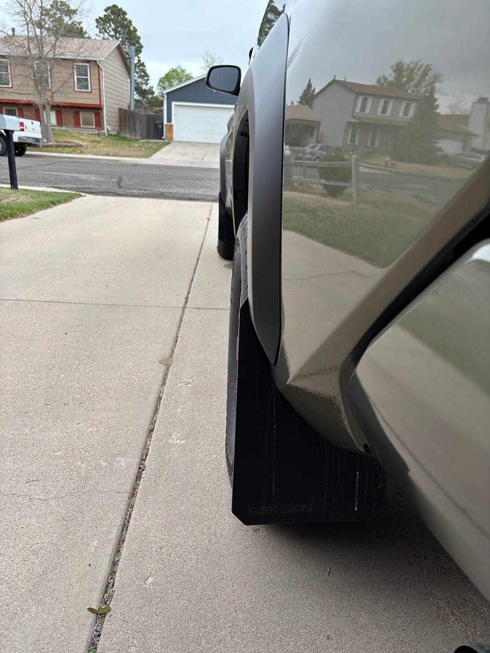 2024 Tacoma Has anyone tried RekGen universal Mud Flaps? Specifically for a Trailhunter? IMG_1177