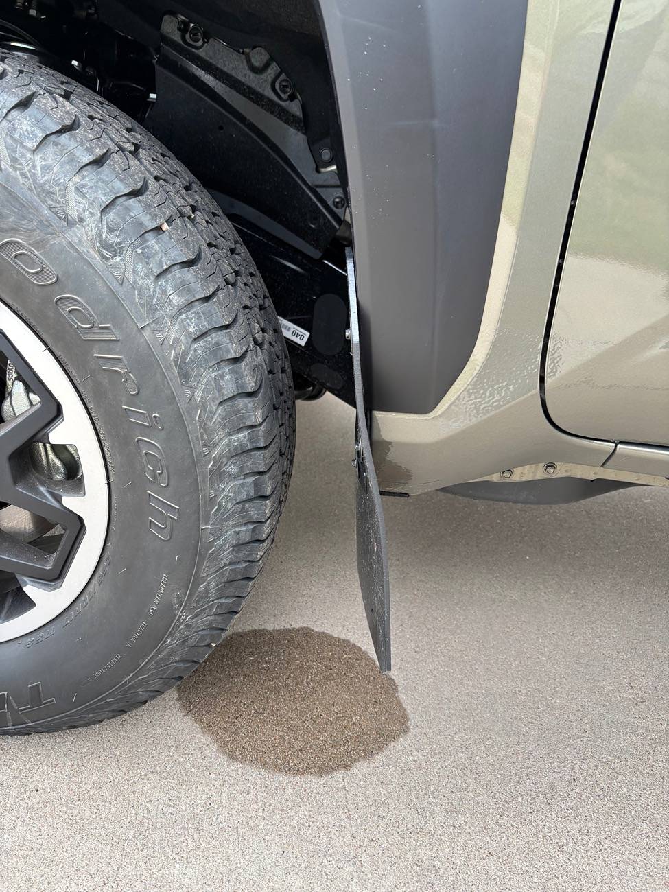 2024 Tacoma Has anyone tried RekGen universal Mud Flaps? Specifically for a Trailhunter? IMG_1179