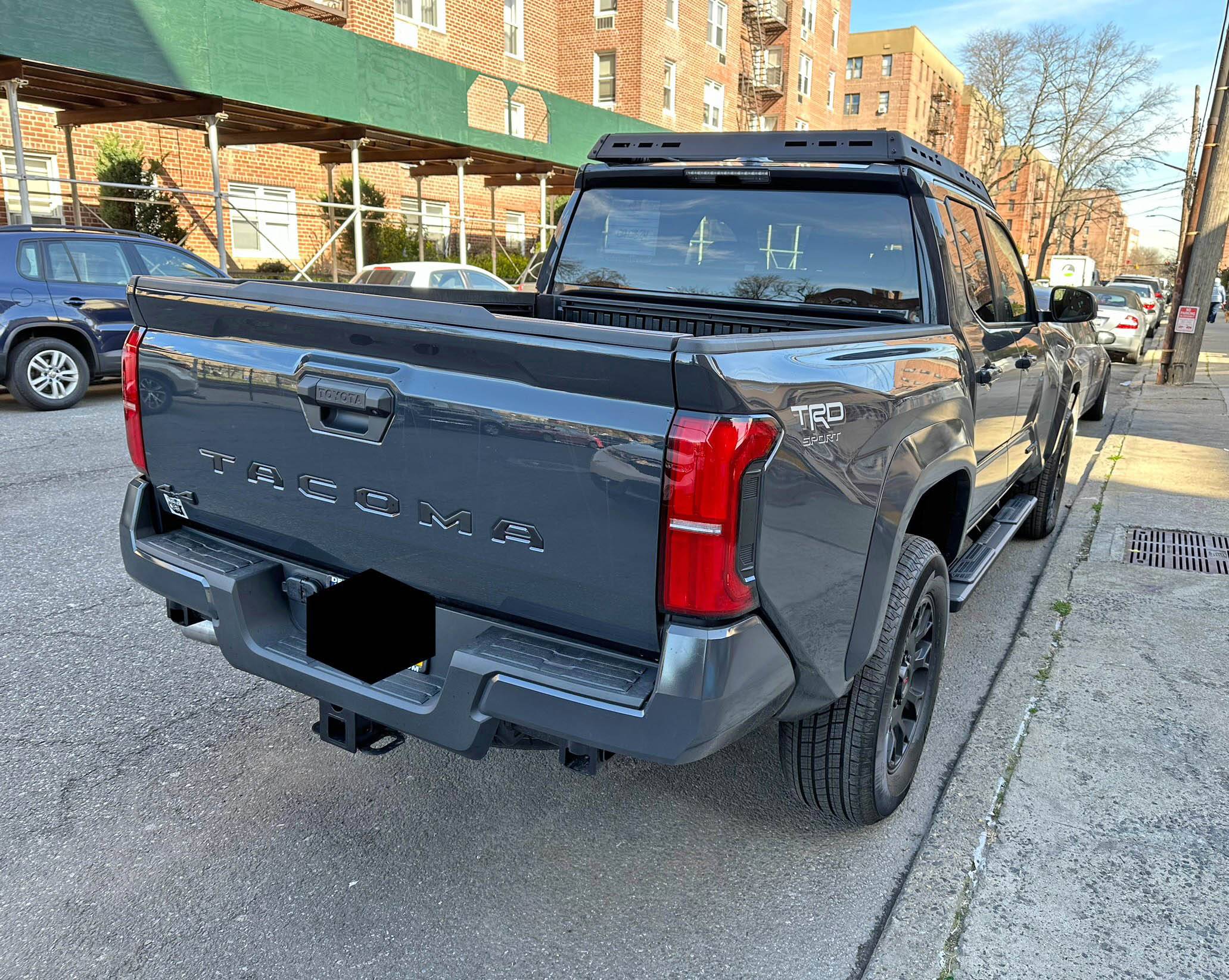 2024 Tacoma 2024 TRD Sport with 18" TRD Wheels, Black Tailgate Insert, Toyota Roof Rack, Tube Steps IMG_1268