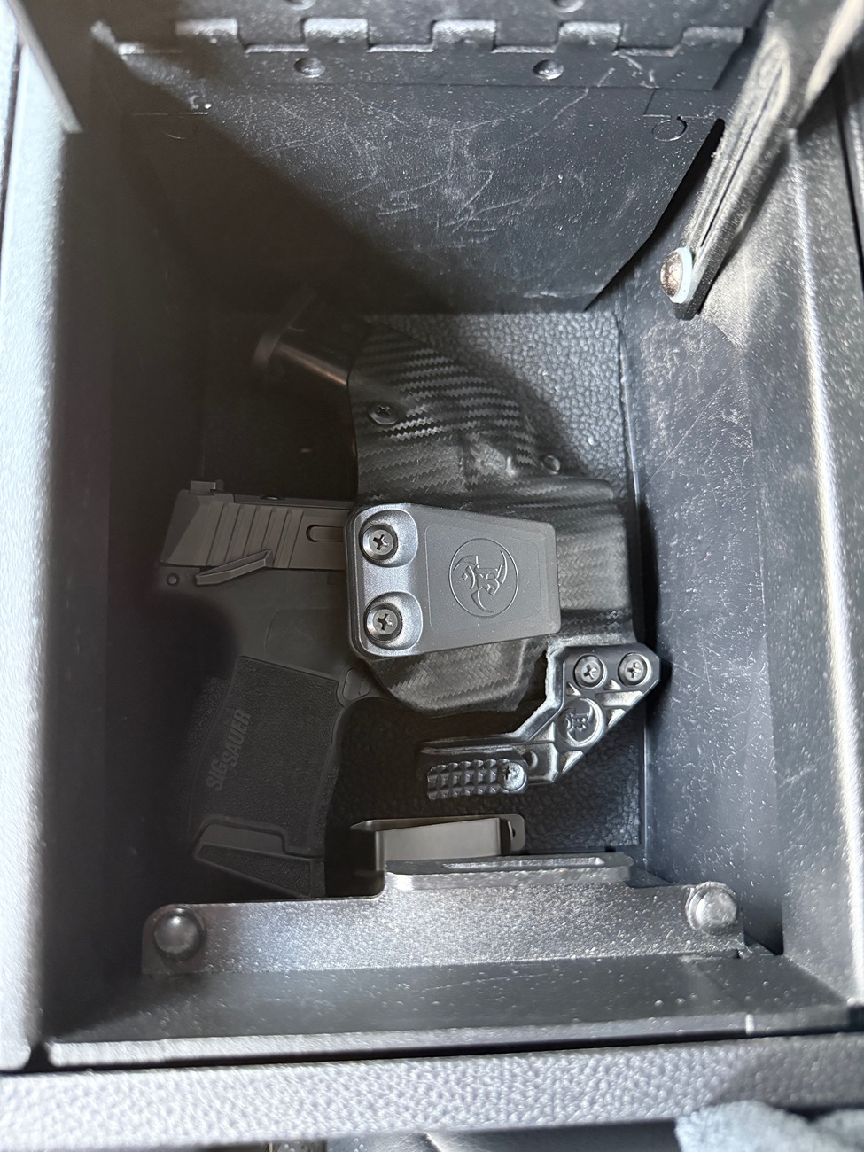 2024 Tacoma OEM Center Console Safe Vault installed photos IMG_4557