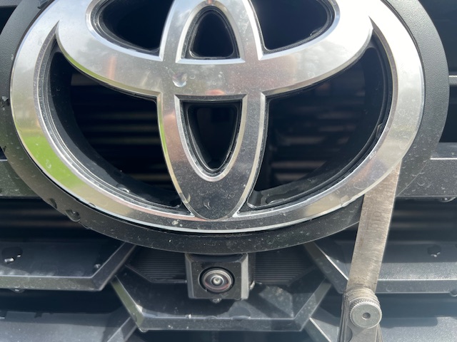 2024 Tacoma Plasti Dip Blackout \ Removing Chrome Toyota emblem on front grill IMG_5637