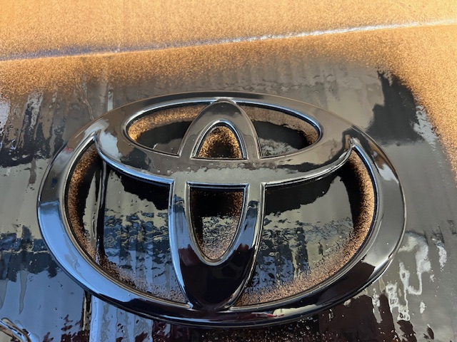 2024 Tacoma Plasti Dip Blackout \ Removing Chrome Toyota emblem on front grill IMG_5642