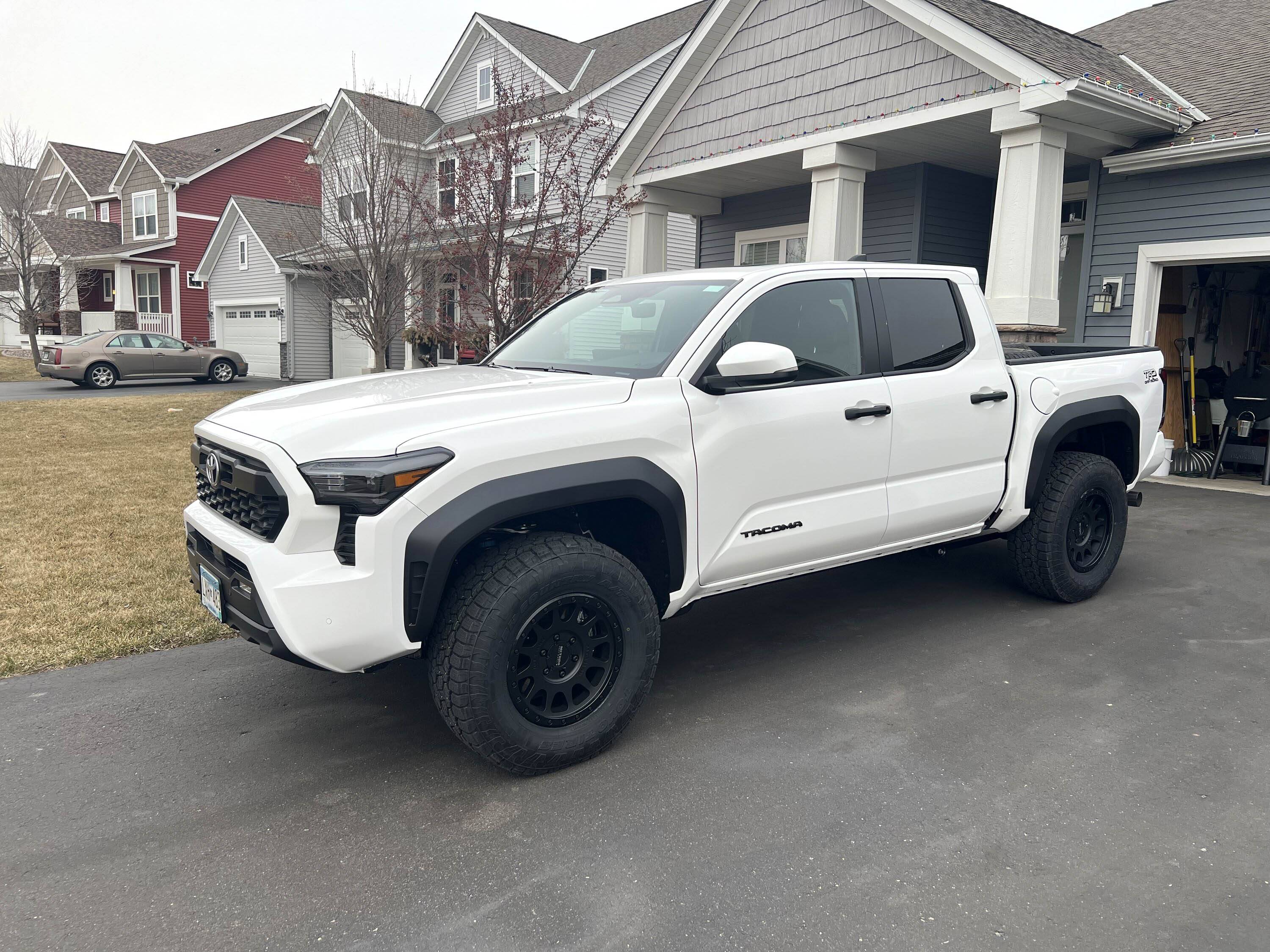 2024 Tacoma 285/70/17 Toyo AT3 tires + Method MR305 NV +25 offset wheels -- stock suspension, no mods, no rub (2024 TRD Off-Road) IMG_5736