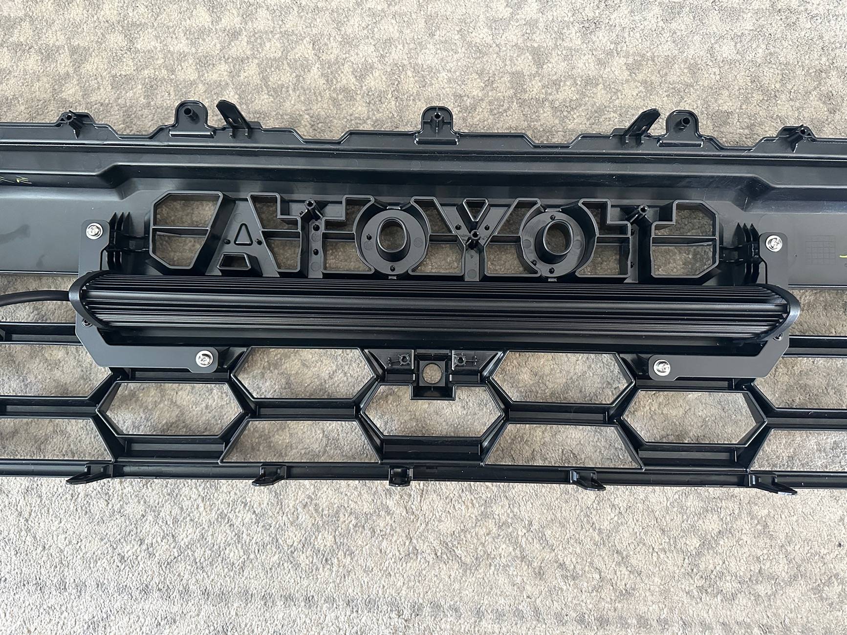 2024 Tacoma Cali Raised LED 20” light bar install on heritage grille IMG_8643