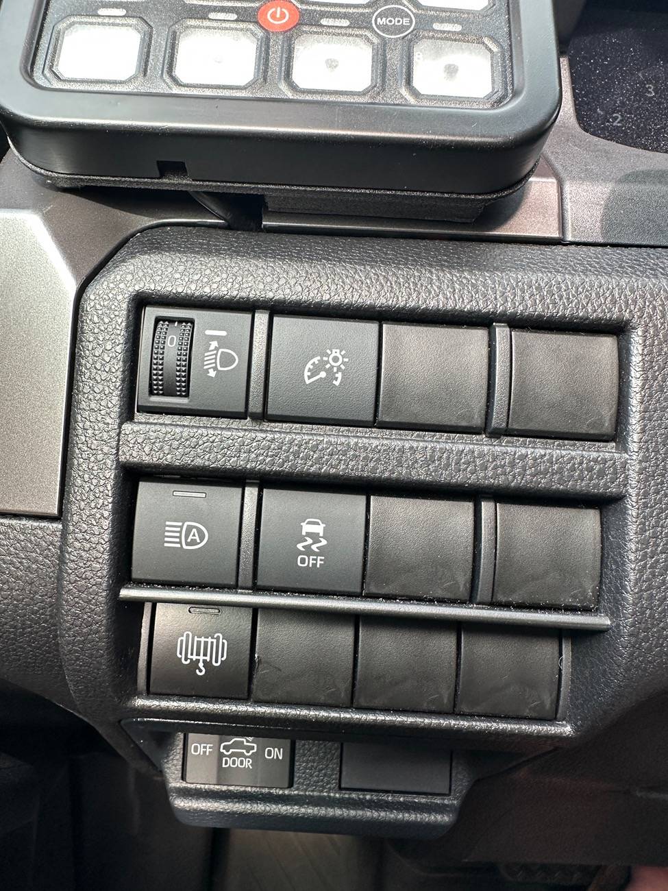 2024 Tacoma Auxbeam switch panel install custom bracket with warn power interrupt kit for winch IMG_9006