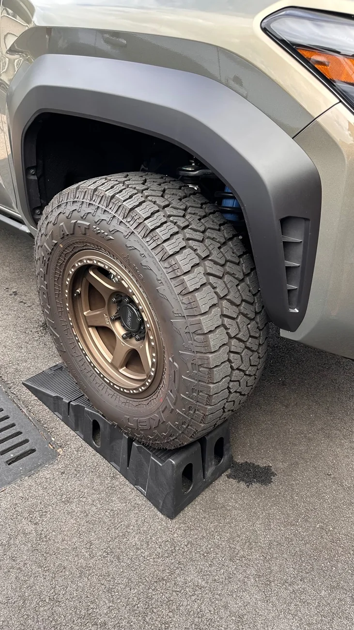 2024 Tacoma Smallest tire for a 2.5” factory lift. IMG_9912