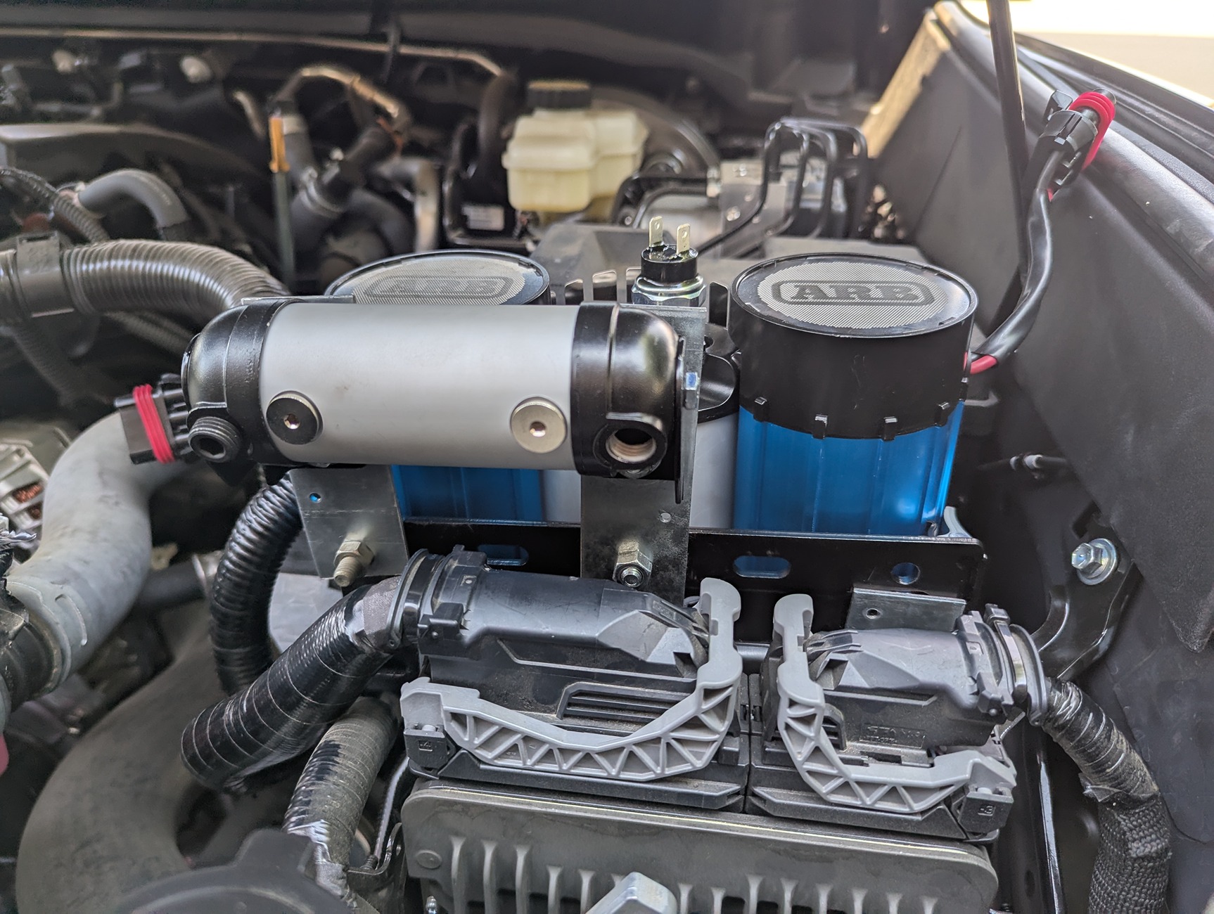2024 Tacoma ARB dual brushless compressor DIY underhood mount on 2025 SR5 Tacoma PXL_20250828_192123408