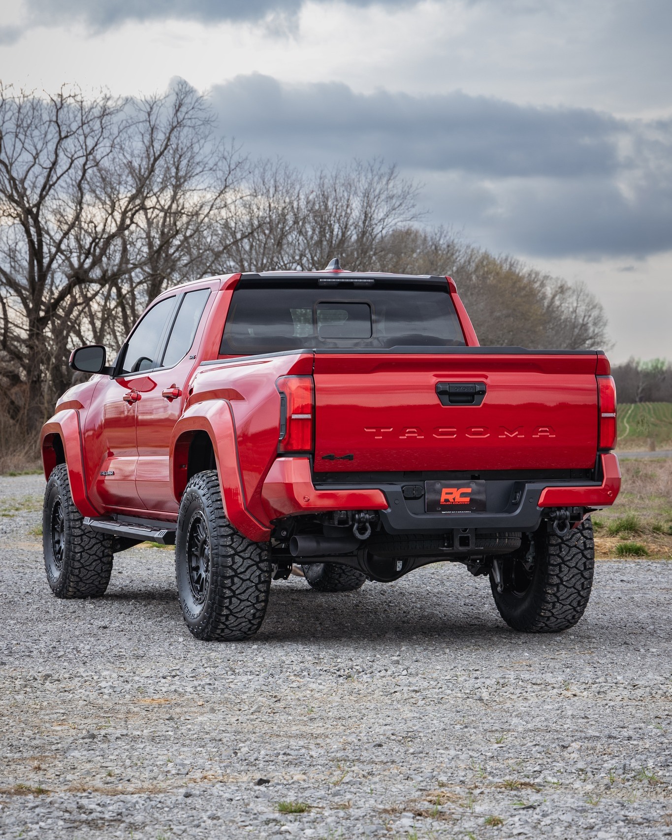 Rough Country 2024 Tacoma 4th Gen parts build: 3.5%22 lift kit, painted fender flares, running...jpg