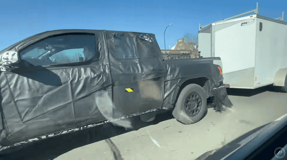 2024 Tacoma Video: 2024 Tacoma Prototype Caught Towing Trailer on Michigan Streets Screenshot 2023-05-01 at 4.40.31 PM