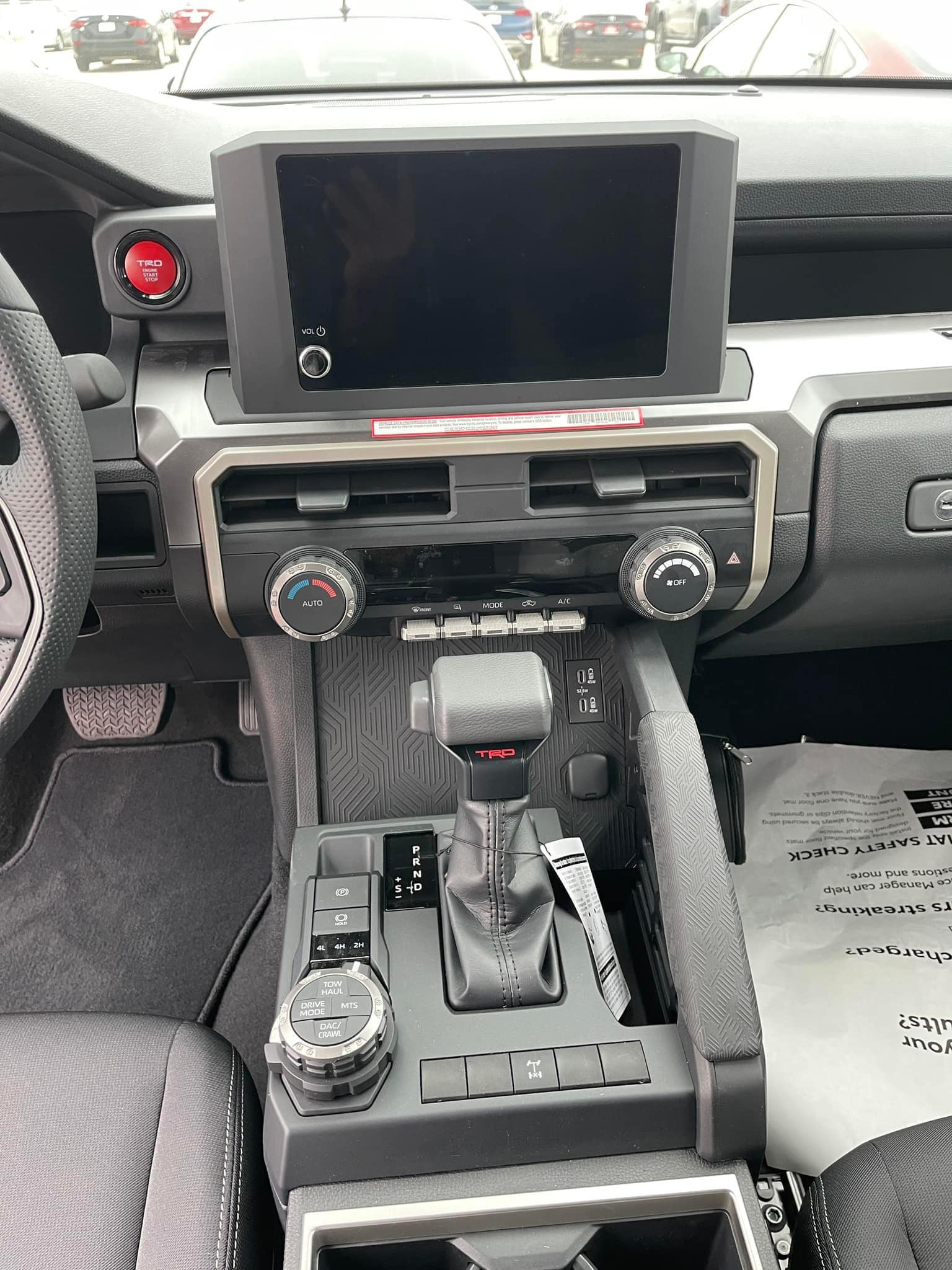 2024 Tacoma Updates of 2024 Tacomas on dealer lots (dealership, pricing, photos) Solar Octane 2024 Tacoma TRD Off-Road interior & exterior at dealership 4