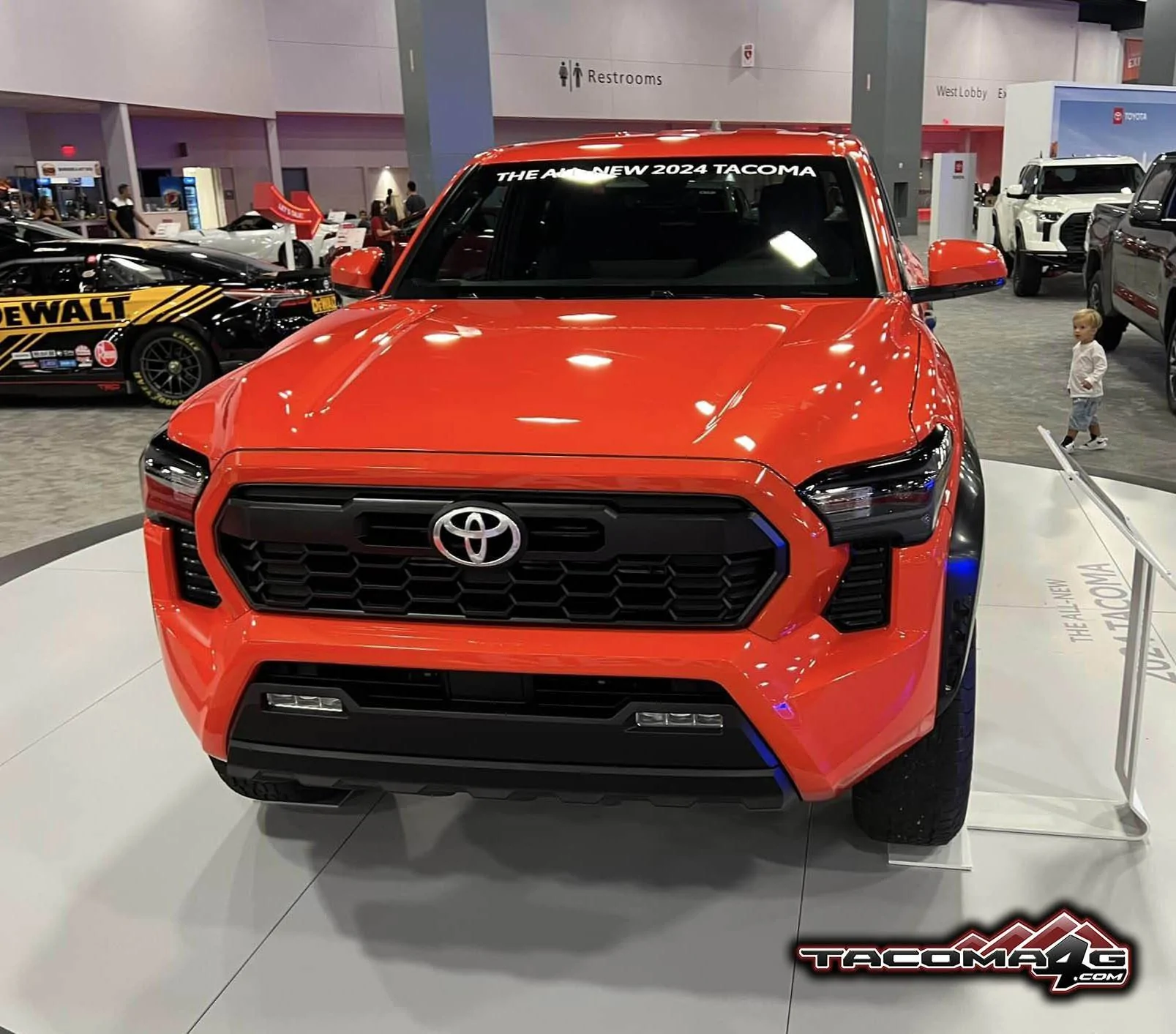 2024 Tacoma 📸 2024 Tacoma TRD Off-Road's first car show (exterior, interior, cloth seats pics from Miami Autoshow 2023) Solar Octane 2024 Toyota Tacoma TRD Off-Road Miami Auto Show 20