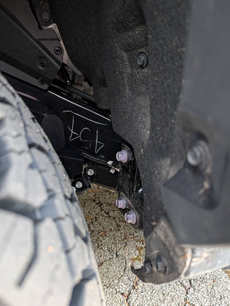 2024 Tacoma Trailhunter max tire size View of area where pad was removed