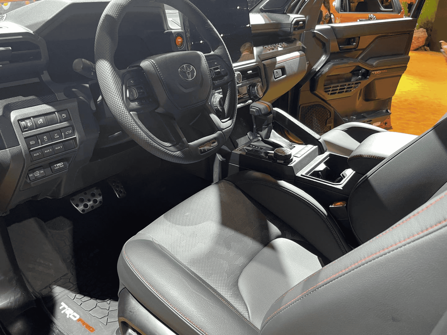 2024 Tacoma 2024 Tacoma TRD Pro (Terra & Wind Chill Pearl White Colors) on display White 2024 Tacoma TRD Pro 2