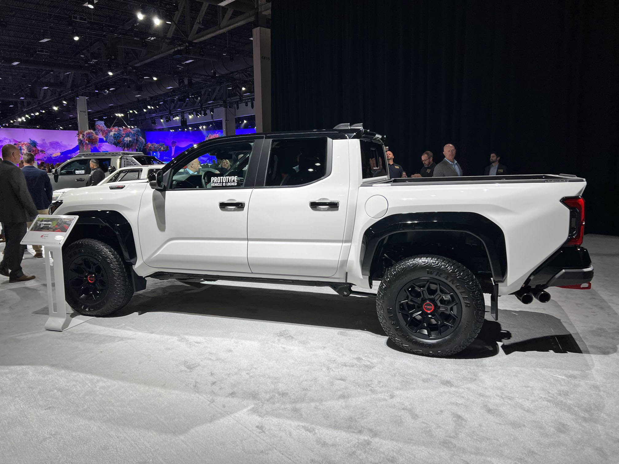 2024 Tacoma Bronze Oxide Trailhunter + Ice Cap White TRD Pro 2024 Tacomas @ Toyota National Dealer Meeting Wind Chill Pearl White 2024 Tacoma TRD Pro  1