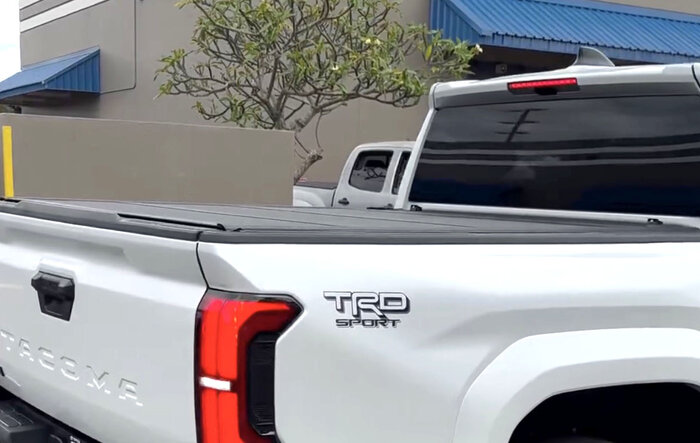 OEM Trifold Hard Tonneau Cover installed on 4th Gen Tacoma - spotted in Hawaii