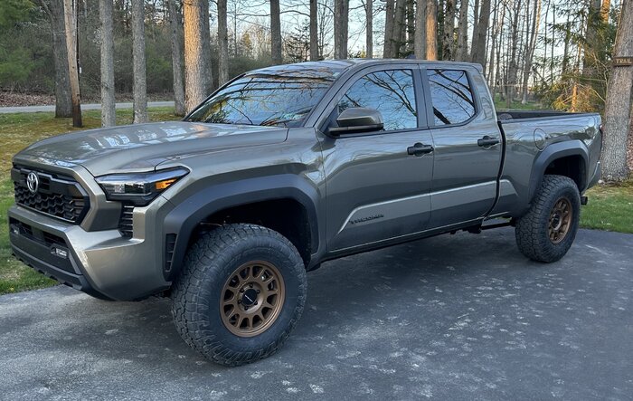 Bronze Oxide 2024 Tacoma TRD Off-Road Long Bed on Westcott lift kit, Method 703 and 285/75R17 Toyo Open Country A/T III tires