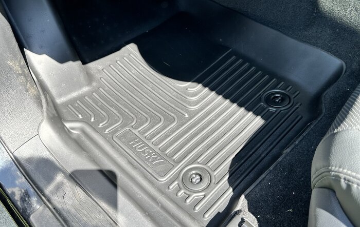 Husky floor mats installed ("manual transmission" option fits automatic transmission 2024 Tacoma)